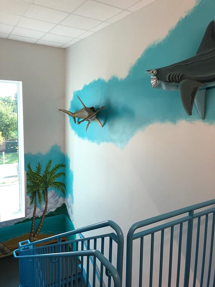 Check out the sharks on the wall